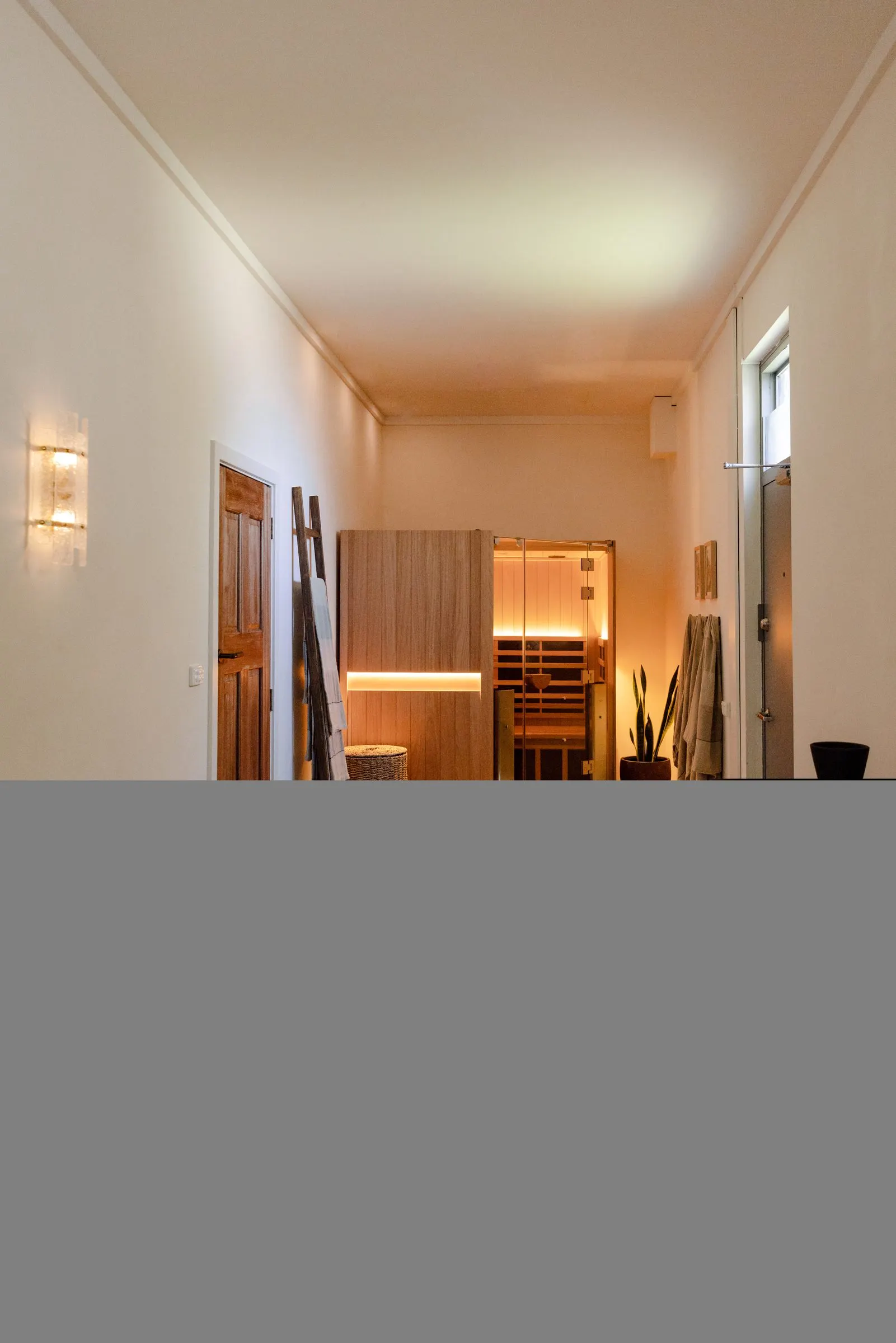 The corridor leading to the recovery area and sauna
